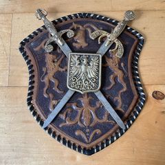 Vintage Spanish-made wall plaque featuring a decorative coat of arms.