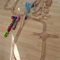 wooden train tracks and full box of Lego Duplo