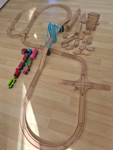 wooden train tracks and full box of Lego Duplo