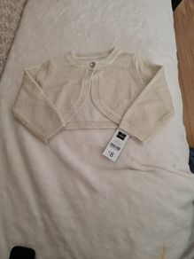 Baby girls gold shrug.