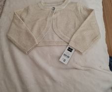 Baby girls gold shrug.