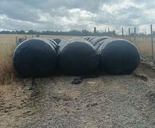 Silage bales and small square hay bales