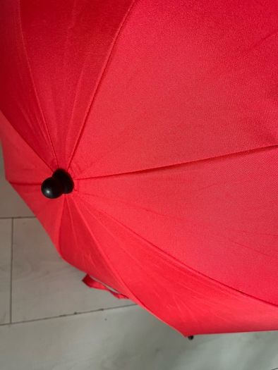 Red and green baby parasols