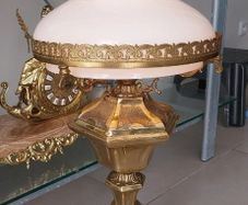Tall heavy brass lamp with glass shade