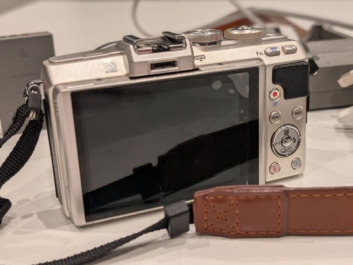 Olympus PEN Lite E-PL7 with 14-42mm lens and accessories
