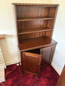 Traditional wooden dresser with shelving and cupboard