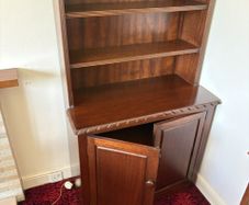 Traditional wooden dresser with shelving and cupboard