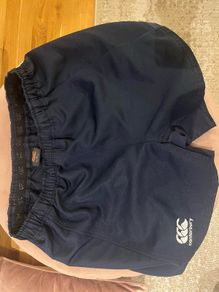 Rugby shorts (XL) & shoulder pads (L)