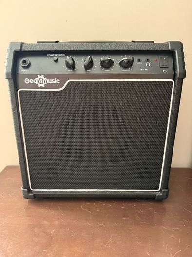 Left handed bass guitar with amp and accessories