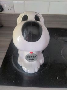 Singing dog treat jar