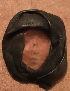 Vintage leather faced mask brooch