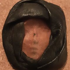 Vintage leather faced mask brooch