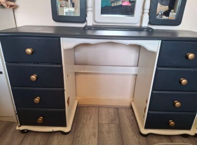 chest of drawers and vanity