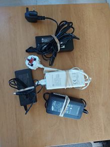 4 Power Adaptors (Chargers), 3 x 12V (Netbix-Leadber-Delta) and 1 Samsung 14v, in excellent condition