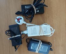 4 Power Adaptors (Chargers), 3 x 12V (Netbix-Leadber-Delta) and 1 Samsung 14v, in excellent condition