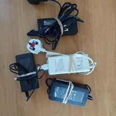 4 Power Adaptors (Chargers), 3 x 12V (Netbix-Leadber-Delta) and 1 Samsung 14v, in excellent condition