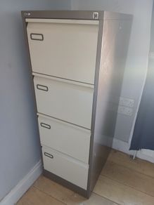 4 drawer steel filing cabinet. Seldom used, perfect condition. Measurements. Height 52" ( 1320mm ) Width 18" ( 460mm ) Depth 25" ( 640mm ) A lot of new files in drawers also.