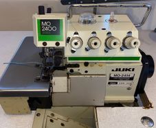 Juki MO 2414 rolled hem industrial overlocker machine