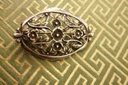 Silver brooch lovely cut out floral design