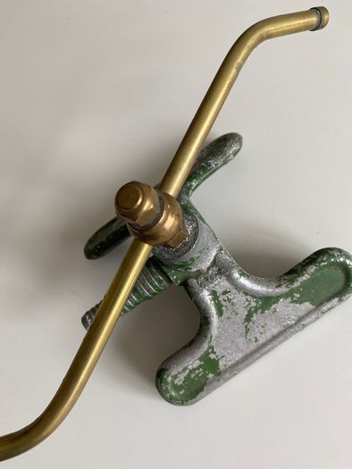Antique revolving garden sprinkler