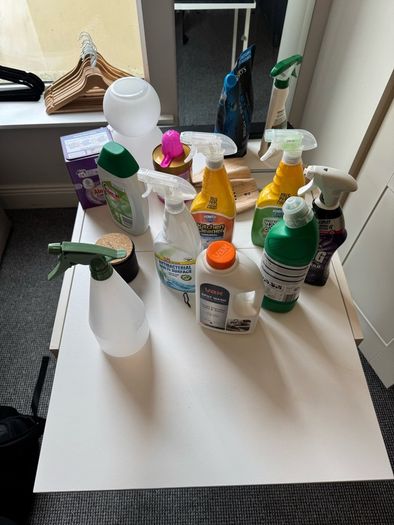 Various cleaning items and shirt hangers