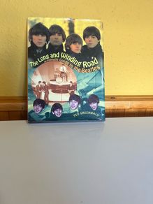 Long and winding road an intimate guide to the Beatles