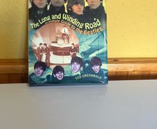 Long and winding road an intimate guide to the Beatles