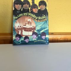 Long and winding road an intimate guide to the Beatles