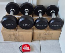 brand new sets of dumbbells .2x5kg, 2x2.5kg