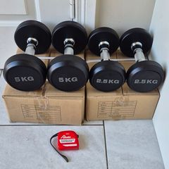 brand new sets of dumbbells .2x5kg, 2x2.5kg