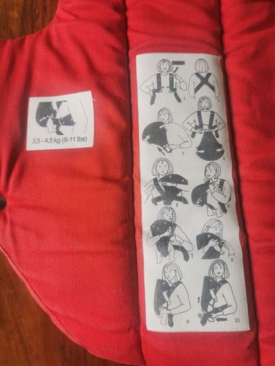 Red Baby Bjorn carrier