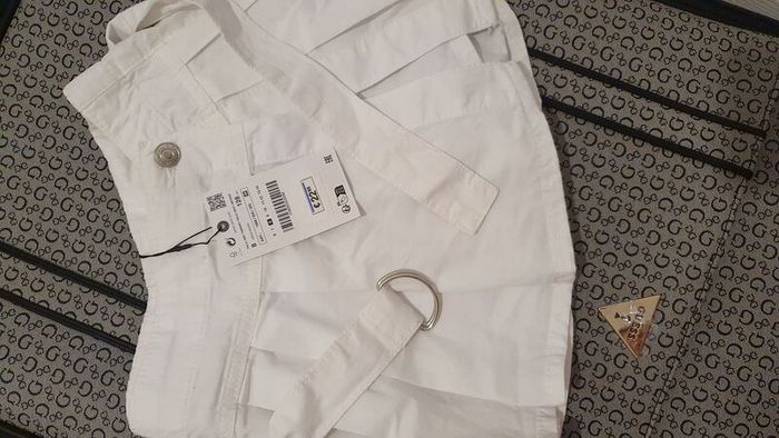 white pleated skirt