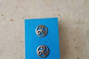 Ear rings Triskele meaning balance body soul mind new and never used and in excellent condition with FREE STANDARD POSTAGE INCLUDED