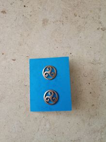 Ear rings Triskele meaning balance body soul mind new and never used and in excellent condition with FREE STANDARD POSTAGE INCLUDED