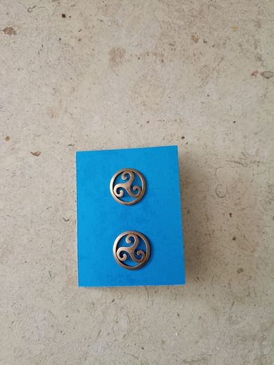 Ear rings Triskele meaning balance body soul mind new and never used and in excellent condition with FREE STANDARD POSTAGE INCLUDED