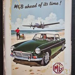 MG , motor company , vintage style metal sign .