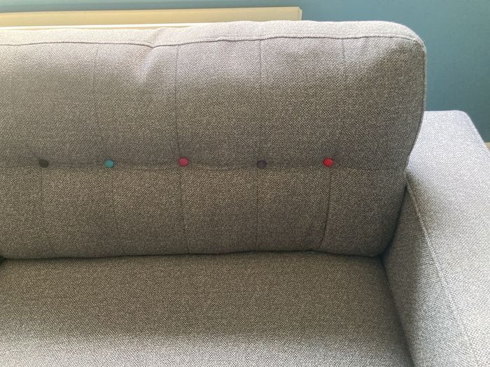Grey DFS sofa and matching footstool