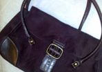 Brown suede/leather handbag.