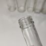 293 - Set of 8 Vintage Clear Glass Decorative Collectible Display Household Bottles Image 6