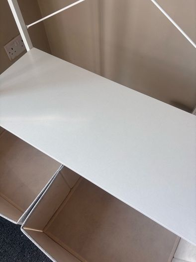 Tall white unit