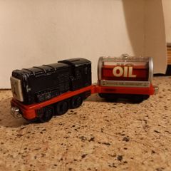 Vintatage steel Thomas  train and carriages. Magnet hook up