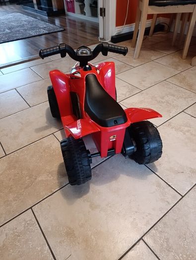 Kids' electric quad bike