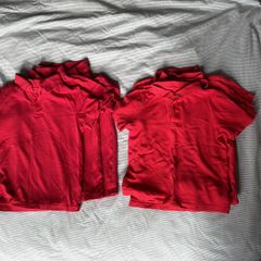 Red polo shirts