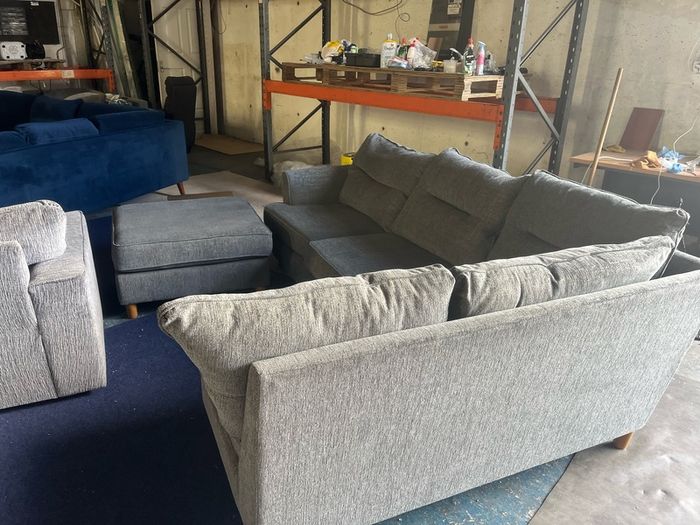 grey corner sofa with matching footstool