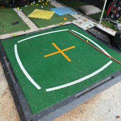 Golf hitting mat with rubber base