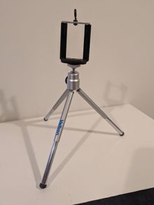 Tripod with mobile holder