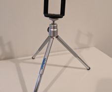Tripod with mobile holder