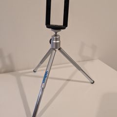 Tripod with mobile holder