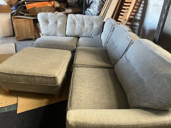 grey corner sofa with matching footstool couch