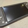 Nintendo Switch Lite + Case, charger, 2x games Image 4